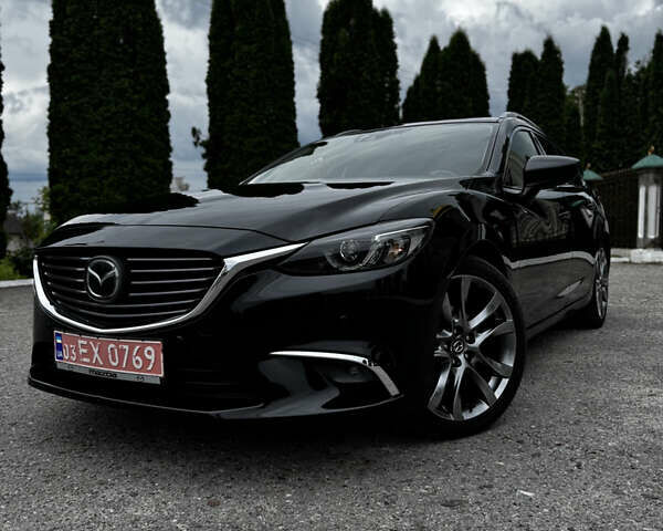 Черный Мазда 6, объемом двигателя 2.2 л и пробегом 173 тыс. км за 14600 $, фото 1 на Automoto.ua