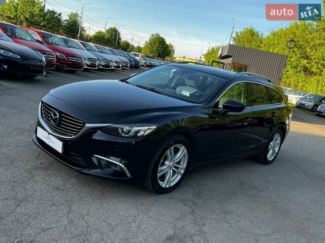 Черный Мазда 6, объемом двигателя 2.19 л и пробегом 204 тыс. км за 13999 $, фото 1 на Automoto.ua
