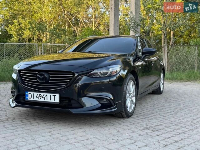 Черный Мазда 6, объемом двигателя 2.19 л и пробегом 248 тыс. км за 13900 $, фото 1 на Automoto.ua