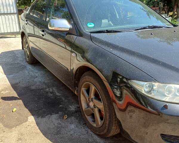 Черный Мазда 6, объемом двигателя 2 л и пробегом 388 тыс. км за 3800 $, фото 1 на Automoto.ua