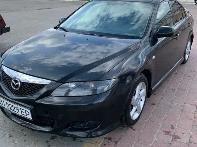 Черный Мазда 6, объемом двигателя 1.8 л и пробегом 190 тыс. км за 4450 $, фото 1 на Automoto.ua
