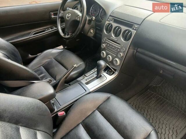 Чорний Мазда 6, об'ємом двигуна 2 л та пробігом 232 тис. км за 4999 $, фото 1 на Automoto.ua