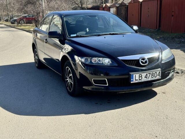 Черный Мазда 6, объемом двигателя 2 л и пробегом 280 тыс. км за 2700 $, фото 1 на Automoto.ua
