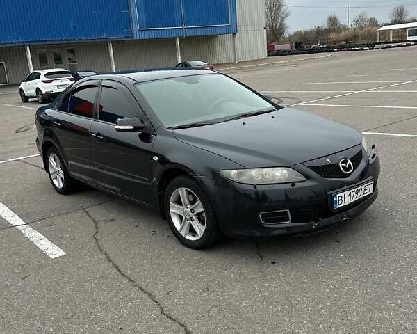 Черный Мазда 6, объемом двигателя 2 л и пробегом 238 тыс. км за 3500 $, фото 1 на Automoto.ua