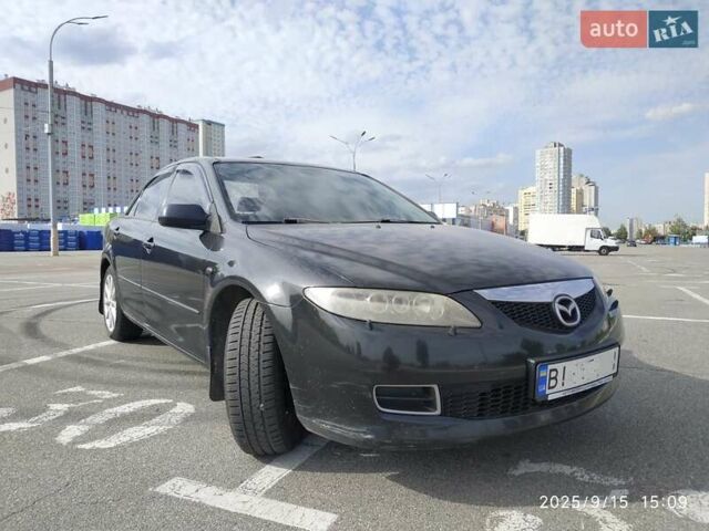 Черный Мазда 6, объемом двигателя 2.3 л и пробегом 199 тыс. км за 3999 $, фото 1 на Automoto.ua