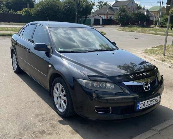 Черный Мазда 6, объемом двигателя 2 л и пробегом 182 тыс. км за 5100 $, фото 1 на Automoto.ua