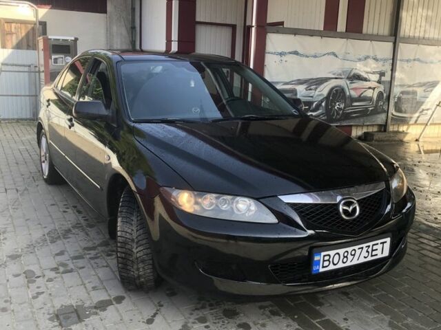 Черный Мазда 6, объемом двигателя 2 л и пробегом 312 тыс. км за 4200 $, фото 1 на Automoto.ua