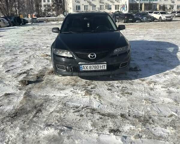 Черный Мазда 6, объемом двигателя 2 л и пробегом 202 тыс. км за 5250 $, фото 1 на Automoto.ua