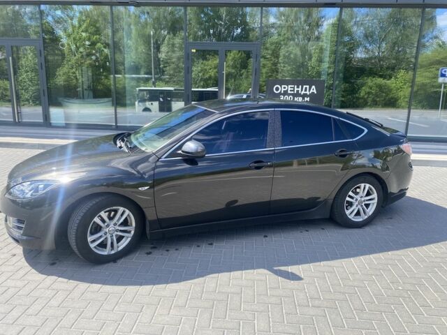 Черный Мазда 6, объемом двигателя 2 л и пробегом 344 тыс. км за 6499 $, фото 1 на Automoto.ua