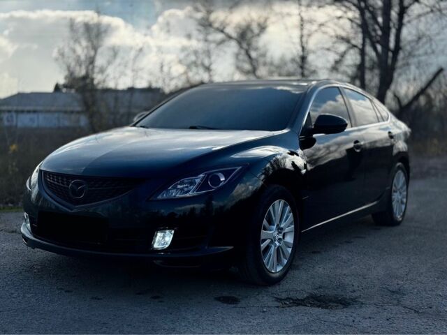 Черный Мазда 6, объемом двигателя 2 л и пробегом 199 тыс. км за 6500 $, фото 1 на Automoto.ua