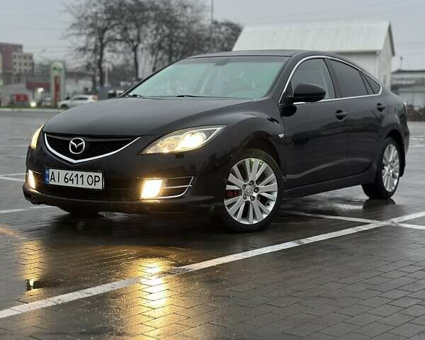 Чорний Мазда 6, об'ємом двигуна 1.8 л та пробігом 248 тис. км за 6299 $, фото 1 на Automoto.ua