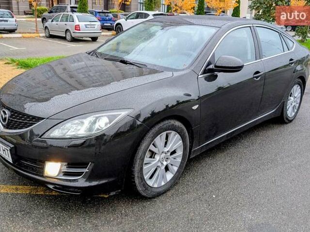 Черный Мазда 6, объемом двигателя 2 л и пробегом 197 тыс. км за 8000 $, фото 1 на Automoto.ua