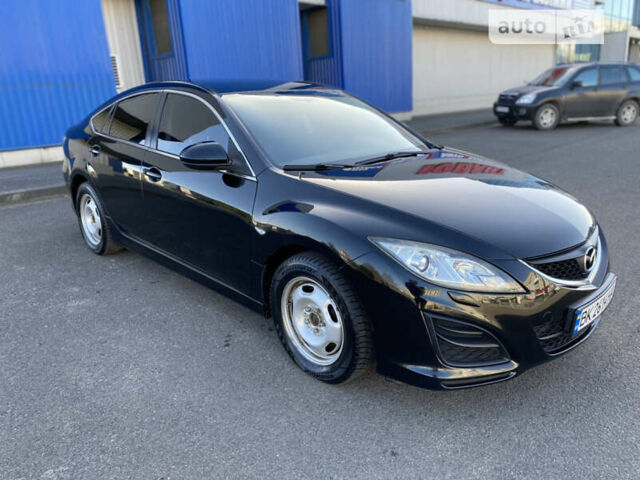 Черный Мазда 6, объемом двигателя 1.8 л и пробегом 184 тыс. км за 7100 $, фото 1 на Automoto.ua