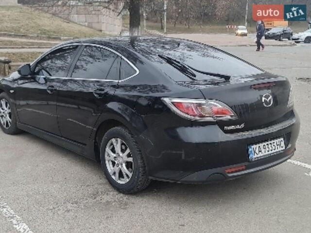 Черный Мазда 6, объемом двигателя 2.2 л и пробегом 360 тыс. км за 8000 $, фото 1 на Automoto.ua