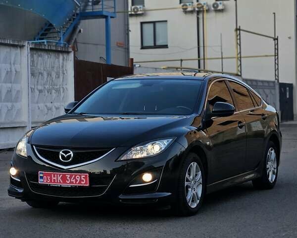 Черный Мазда 6, объемом двигателя 2 л и пробегом 219 тыс. км за 8500 $, фото 1 на Automoto.ua