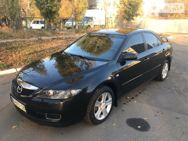 Чорний Мазда 6, об'ємом двигуна 2 л та пробігом 216 тис. км за 6699 $, фото 1 на Automoto.ua