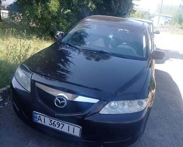 Фиолетовый Мазда 6, объемом двигателя 2 л и пробегом 295 тыс. км за 3200 $, фото 1 на Automoto.ua