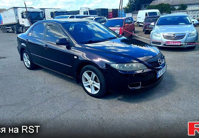 Фиолетовый Мазда 6, объемом двигателя 2 л и пробегом 236 тыс. км за 3400 $, фото 1 на Automoto.ua