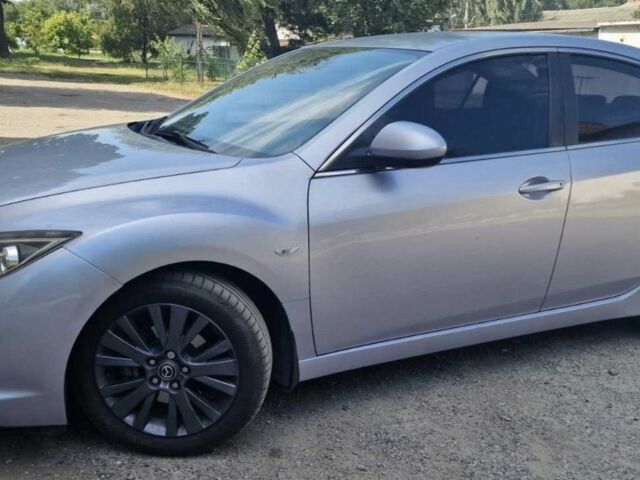 Фиолетовый Мазда 6, объемом двигателя 2 л и пробегом 212 тыс. км за 5991 $, фото 1 на Automoto.ua