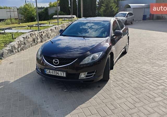 Фиолетовый Мазда 6, объемом двигателя 2.5 л и пробегом 255 тыс. км за 7999 $, фото 1 на Automoto.ua