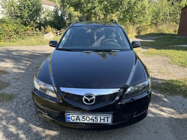 Фиолетовый Мазда 6, объемом двигателя 2 л и пробегом 219 тыс. км за 5000 $, фото 1 на Automoto.ua