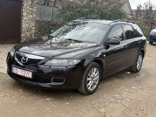 Фиолетовый Мазда 6, объемом двигателя 2 л и пробегом 250 тыс. км за 3290 $, фото 1 на Automoto.ua