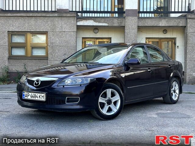 Коричневый Мазда 6, объемом двигателя 2 л и пробегом 309 тыс. км за 5000 $, фото 1 на Automoto.ua