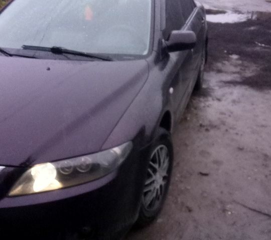 Коричневый Мазда 6, объемом двигателя 2 л и пробегом 320 тыс. км за 3800 $, фото 1 на Automoto.ua