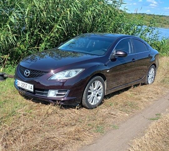Коричневый Мазда 6, объемом двигателя 2 л и пробегом 270 тыс. км за 6500 $, фото 1 на Automoto.ua