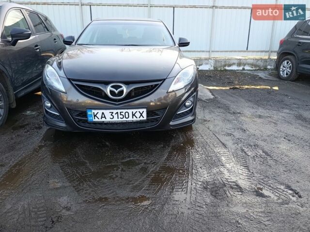 Коричневый Мазда 6, объемом двигателя 2 л и пробегом 252 тыс. км за 9500 $, фото 1 на Automoto.ua