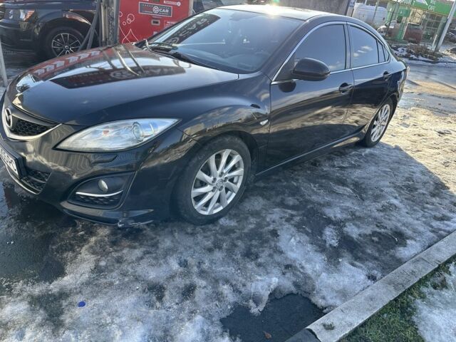 Коричневый Мазда 6, объемом двигателя 2 л и пробегом 306 тыс. км за 6650 $, фото 1 на Automoto.ua