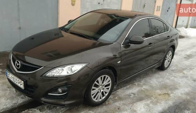 Коричневий Мазда 6, об'ємом двигуна 2 л та пробігом 251 тис. км за 7700 $, фото 1 на Automoto.ua