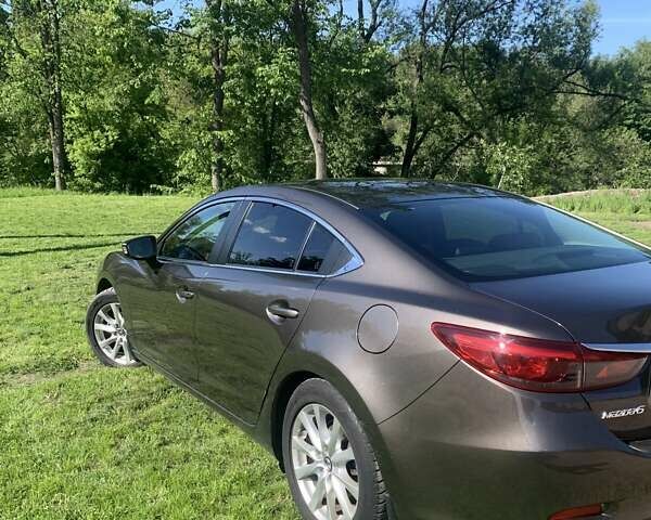 Коричневый Мазда 6, объемом двигателя 2.19 л и пробегом 188 тыс. км за 13700 $, фото 1 на Automoto.ua