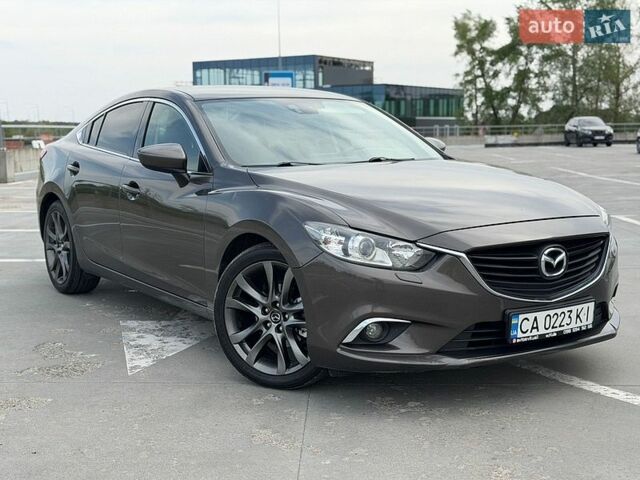 Коричневый Мазда 6, объемом двигателя 2 л и пробегом 160 тыс. км за 14200 $, фото 1 на Automoto.ua