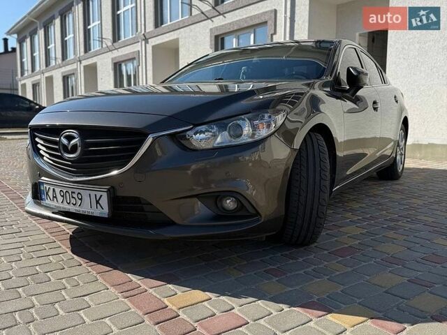 Коричневый Мазда 6, объемом двигателя 2 л и пробегом 229 тыс. км за 13000 $, фото 1 на Automoto.ua