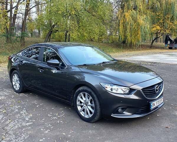 Коричневый Мазда 6, объемом двигателя 2 л и пробегом 233 тыс. км за 16500 $, фото 1 на Automoto.ua