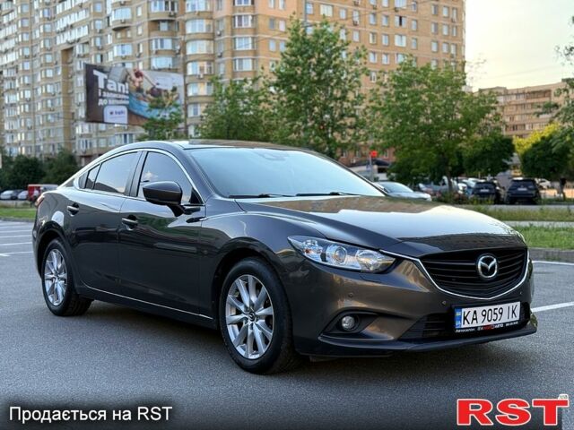 Коричневый Мазда 6, объемом двигателя 2 л и пробегом 169 тыс. км за 13900 $, фото 1 на Automoto.ua