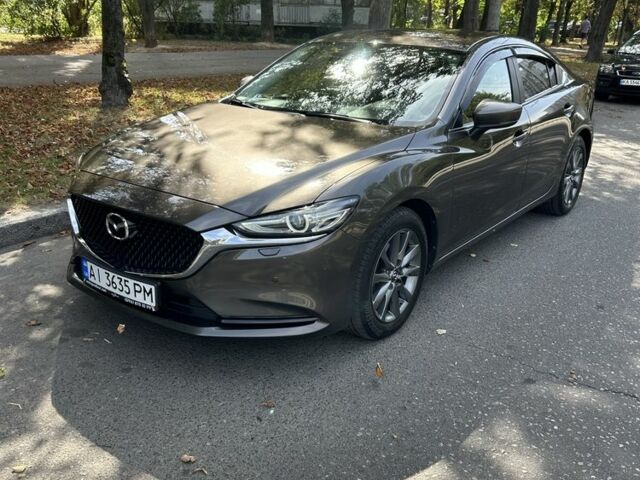 Коричневый Мазда 6, объемом двигателя 2.5 л и пробегом 93 тыс. км за 19000 $, фото 1 на Automoto.ua