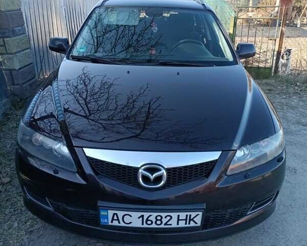 Коричневый Мазда 6, объемом двигателя 2 л и пробегом 246 тыс. км за 5200 $, фото 1 на Automoto.ua