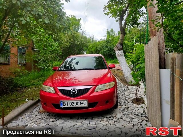 Красный Мазда 6, объемом двигателя 2 л и пробегом 265 тыс. км за 5000 $, фото 1 на Automoto.ua
