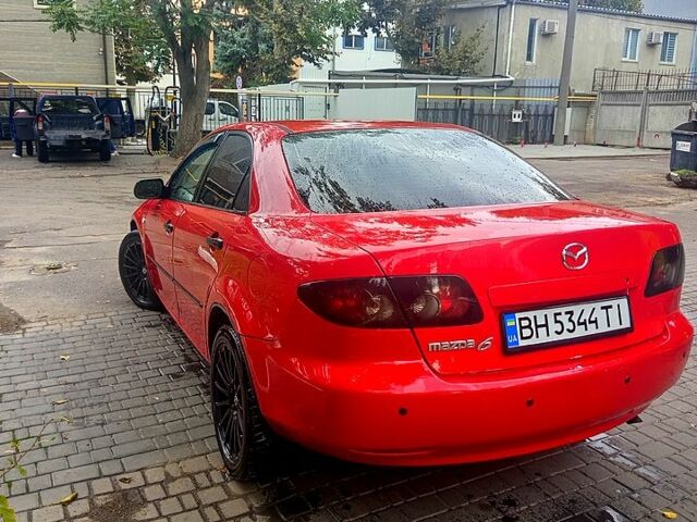 Красный Мазда 6, объемом двигателя 2 л и пробегом 280 тыс. км за 4500 $, фото 1 на Automoto.ua