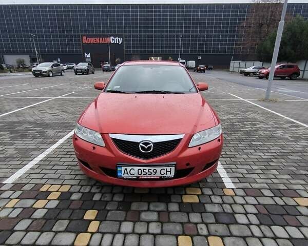 Красный Мазда 6, объемом двигателя 2 л и пробегом 248 тыс. км за 3900 $, фото 1 на Automoto.ua