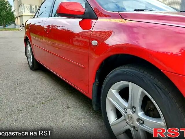 Красный Мазда 6, объемом двигателя 2 л и пробегом 277 тыс. км за 5100 $, фото 1 на Automoto.ua