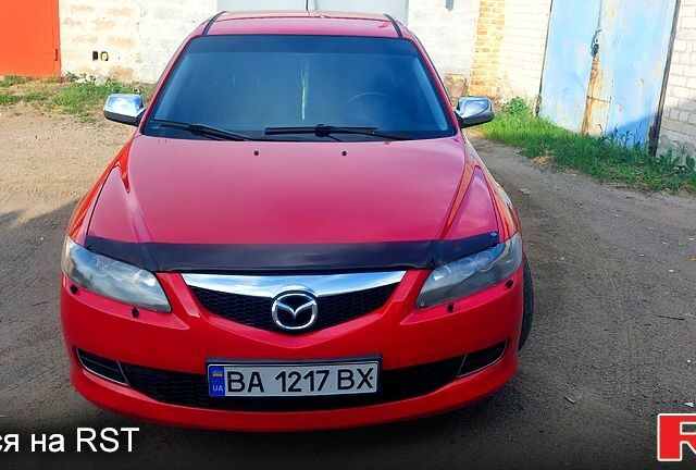Красный Мазда 6, объемом двигателя 2 л и пробегом 156 тыс. км за 6000 $, фото 1 на Automoto.ua