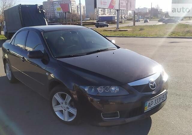 Красный Мазда 6, объемом двигателя 2 л и пробегом 240 тыс. км за 6500 $, фото 1 на Automoto.ua