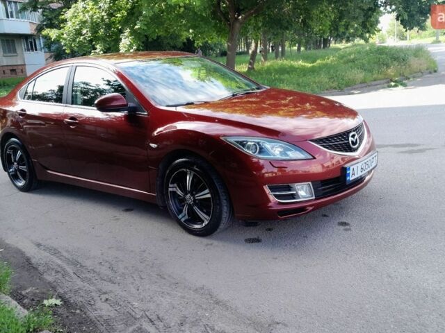 Красный Мазда 6, объемом двигателя 2 л и пробегом 255 тыс. км за 6500 $, фото 1 на Automoto.ua