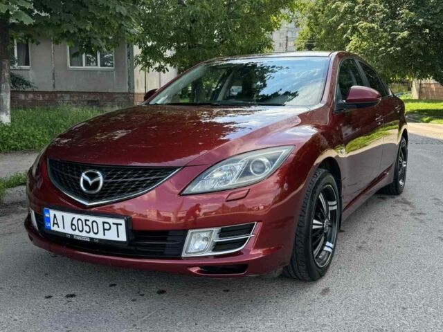 Красный Мазда 6, объемом двигателя 2 л и пробегом 254 тыс. км за 6488 $, фото 1 на Automoto.ua