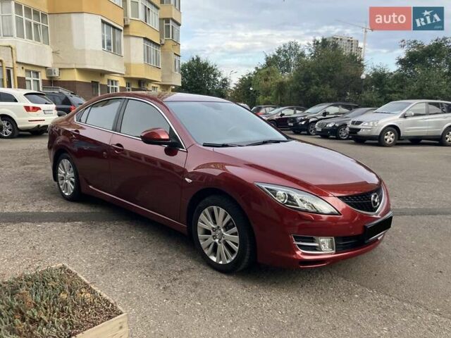 Красный Мазда 6, объемом двигателя 2 л и пробегом 93 тыс. км за 10700 $, фото 1 на Automoto.ua