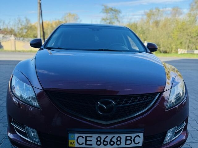 Красный Мазда 6, объемом двигателя 2 л и пробегом 246 тыс. км за 8424 $, фото 1 на Automoto.ua