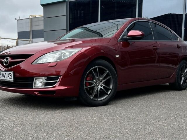 Красный Мазда 6, объемом двигателя 2 л и пробегом 240 тыс. км за 7550 $, фото 1 на Automoto.ua